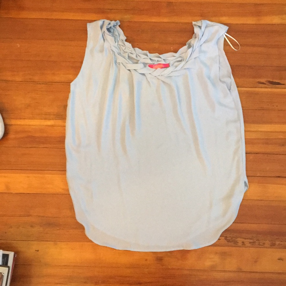 Light blue, sleeveless blouse